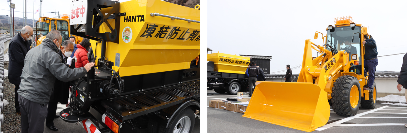 凍結防止剤散布車と除雪ドーザー
